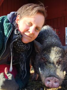Nina and Gotte, one of the pigs that was rescued