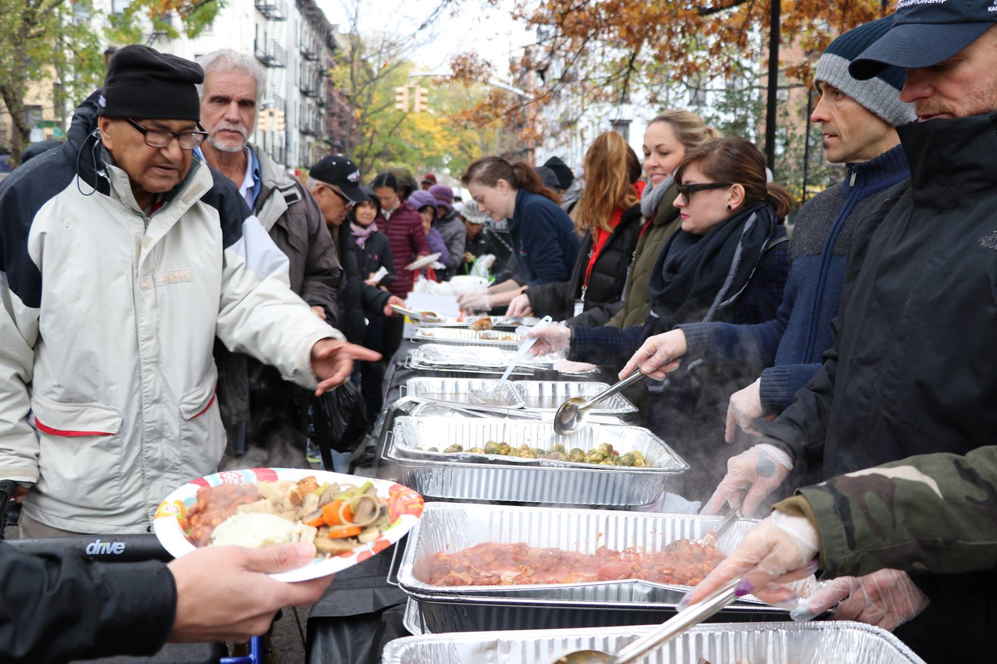 Inclusive contemporary dance class in Spain with Deaf and hearing participants, including a wheelchair user, moving together in a grassroots arts program