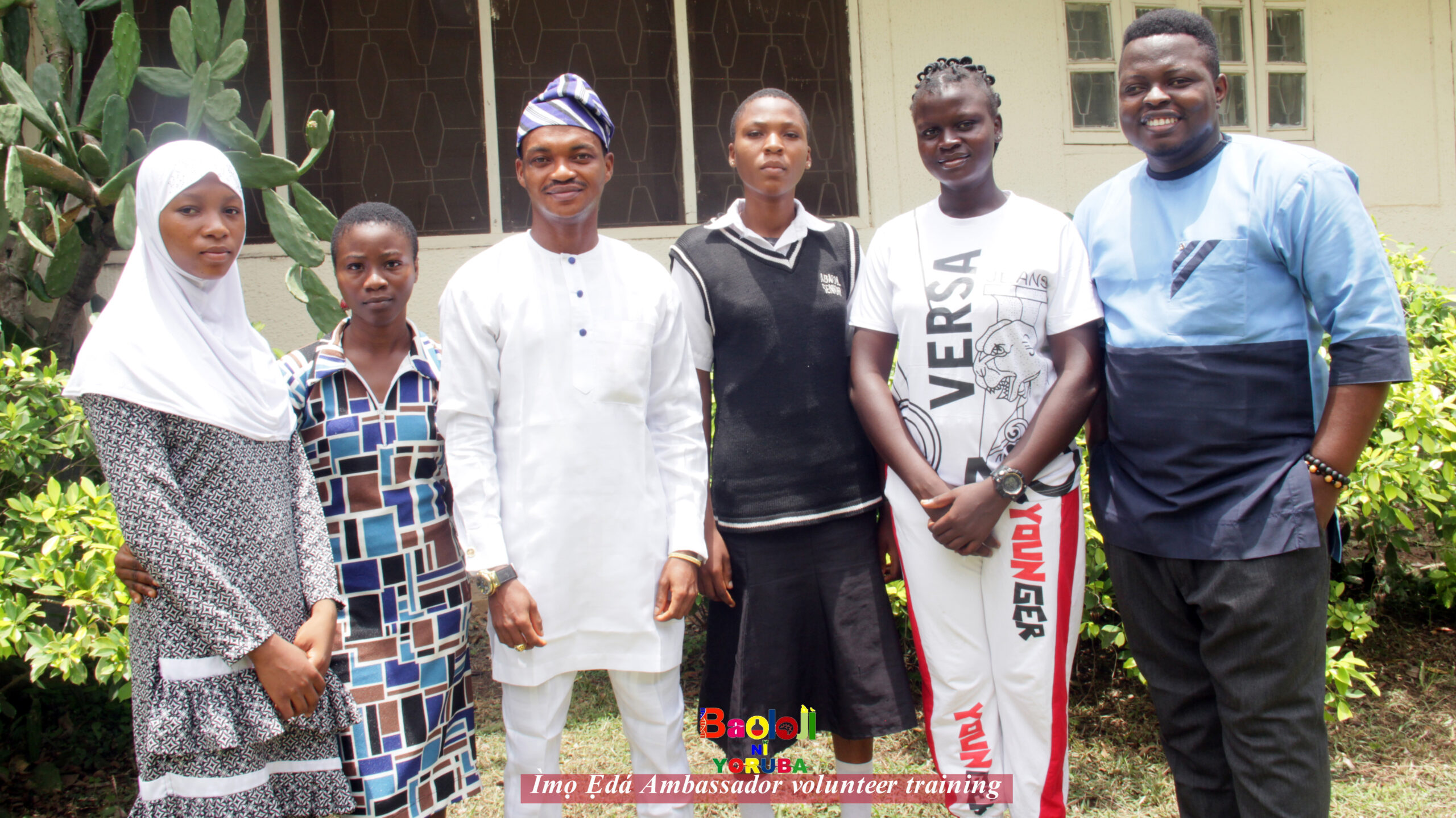 Teacher at a paper board