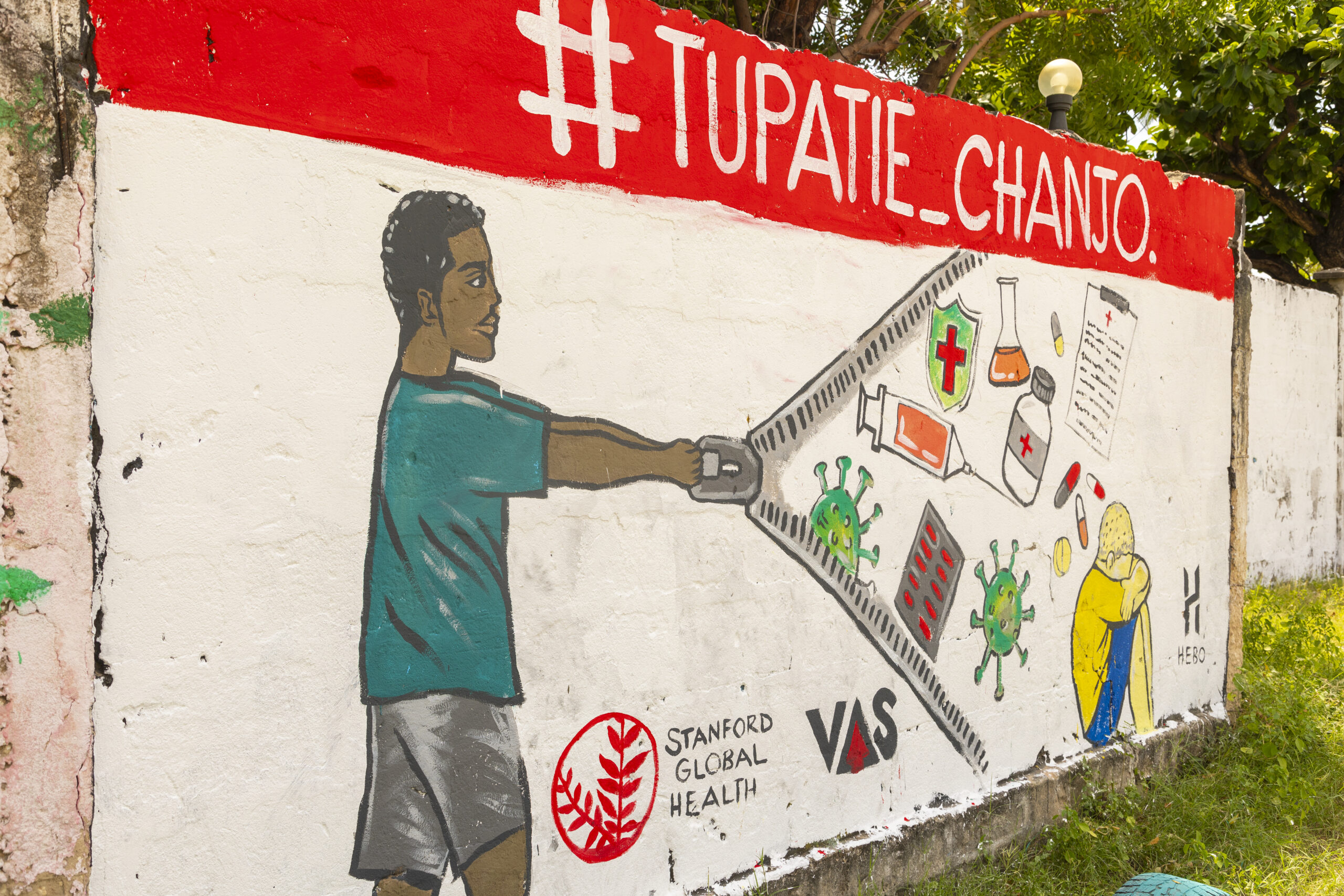 Loo of Fix It Forward on the image of a man repairing a car