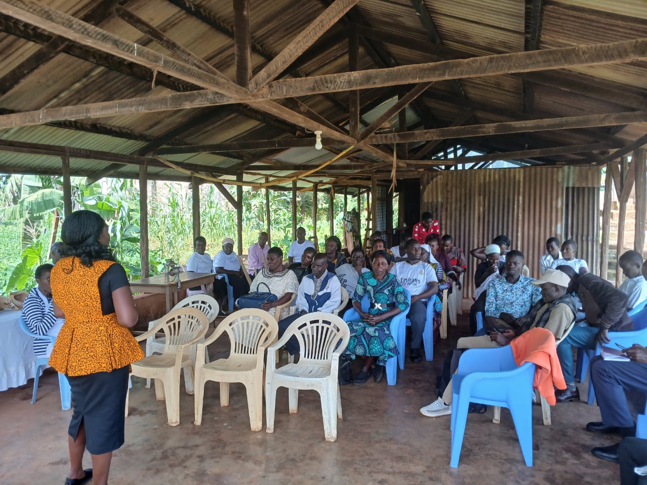 Loo of Fix It Forward on the image of a man repairing a car