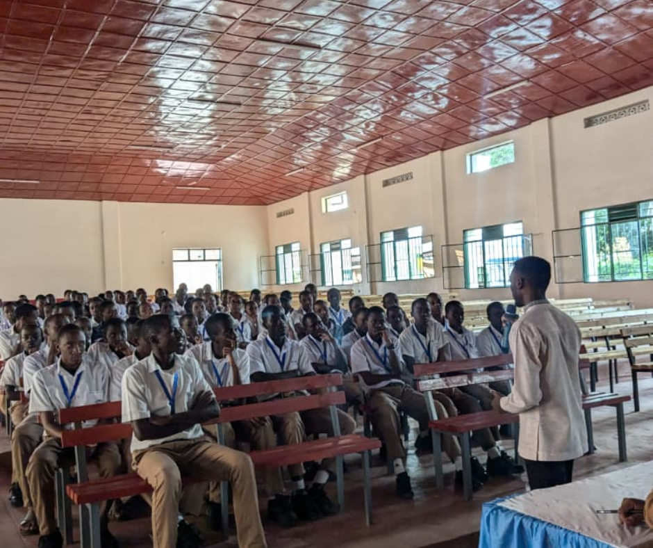 Many students in a classroom in Rwanda with a teacher